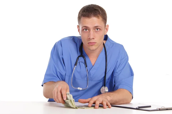 Läkare och pengar — Stockfoto