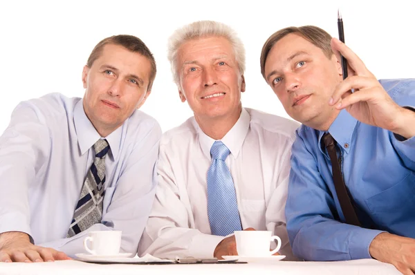 Три симпатичных бизнесмена — стоковое фото