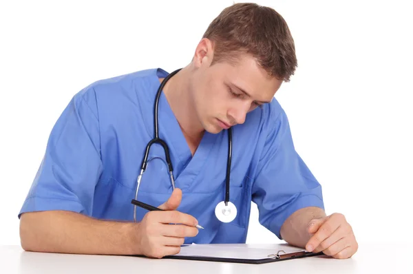 Doctor at table — Stock Photo, Image