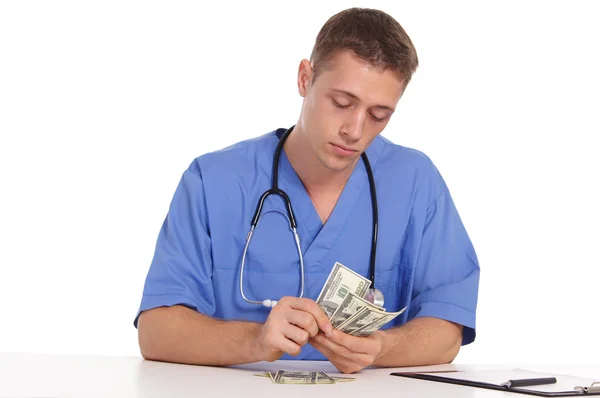 Läkare och kontanter — Stockfoto