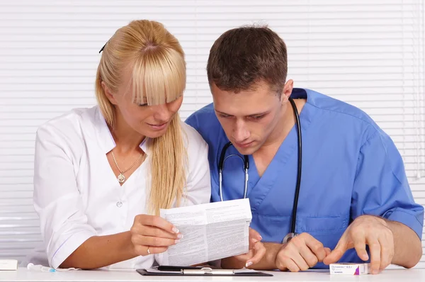Doctor and nurse at office — Stock Photo, Image