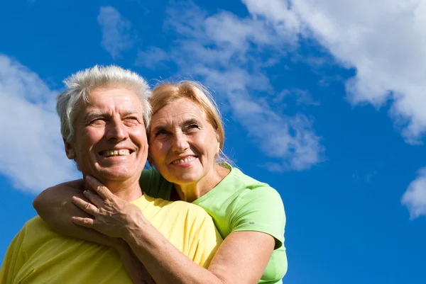 Old couple at a sky — Stock Photo, Image