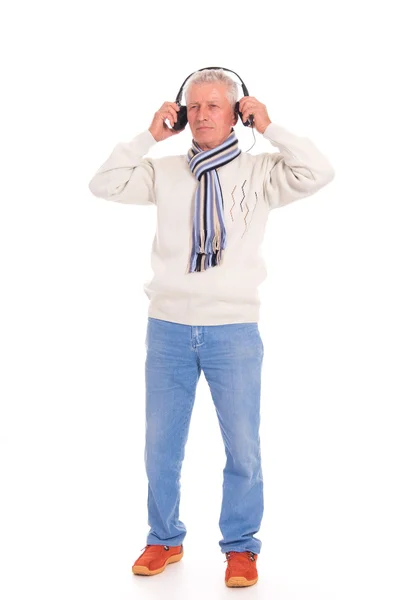 Homem velho com fones de ouvido — Fotografia de Stock