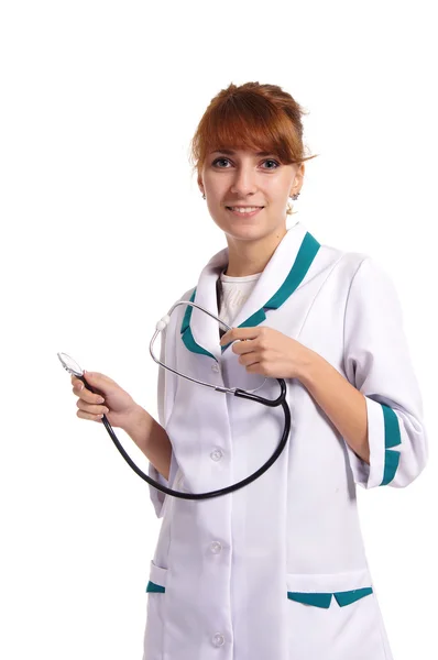 Mladá zdravotní sestra na bílém pozadí — Stock fotografie