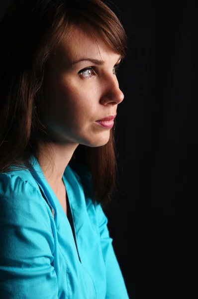 Woman on a black — Stock Photo, Image