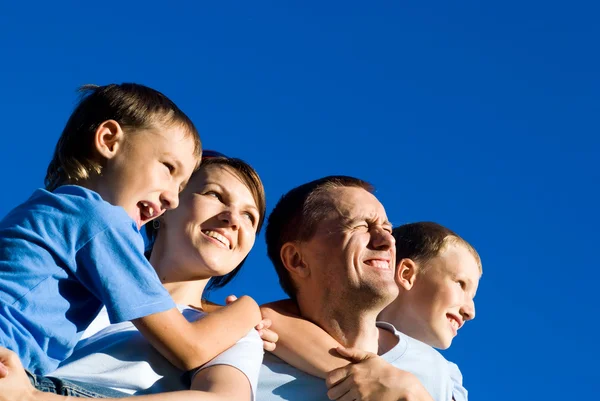Cute family and sky — Stock Photo, Image