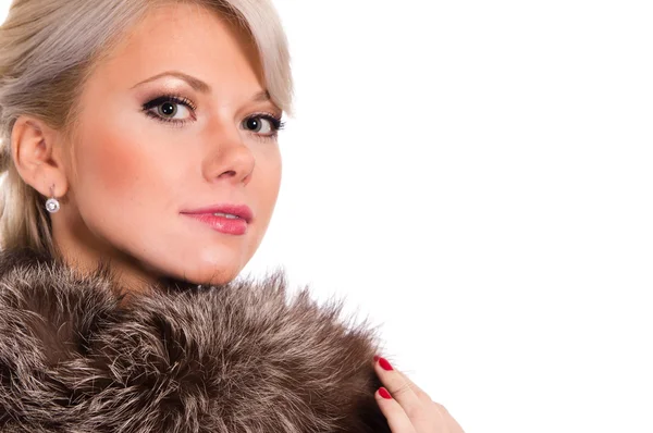 Blonde with a fur Stock Image