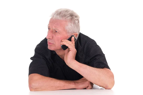 Old man lying with phone — Stock Photo, Image