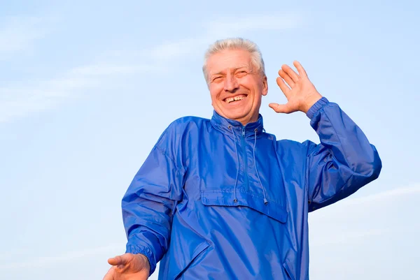 Happy old guy at sky — Stock Photo, Image