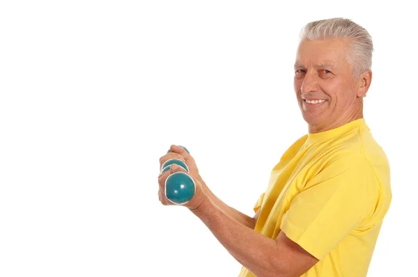 Oude man met stom klokken op wit — Stockfoto