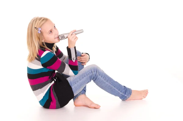 Little girl singing on white — Stock Photo, Image