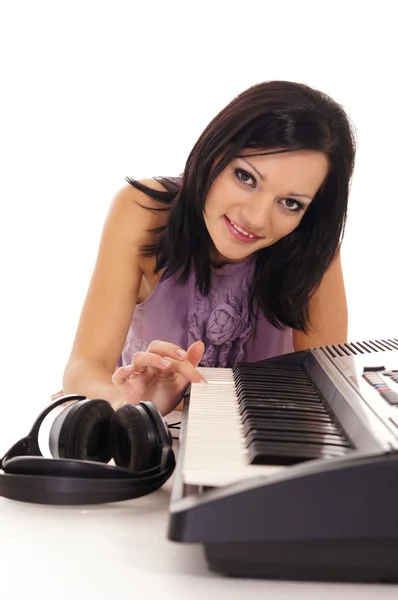 Woman and piano — Stock Photo, Image