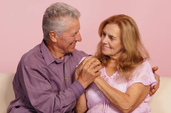 stock image Old couple on pink