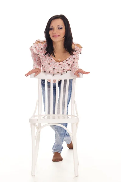 Girl and chair — Stock Photo, Image