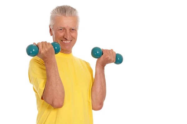 Old sportsman with dumb bells — Stock Photo, Image