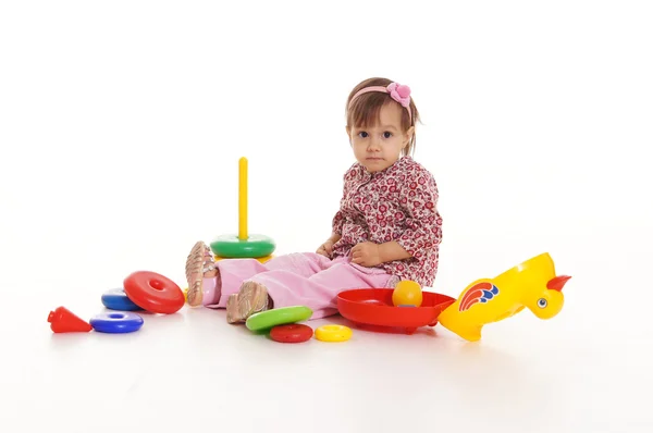 Dziewczynka z zabawkami — Zdjęcie stockowe