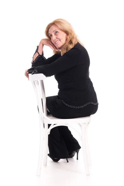 Linda anciana en silla — Foto de Stock