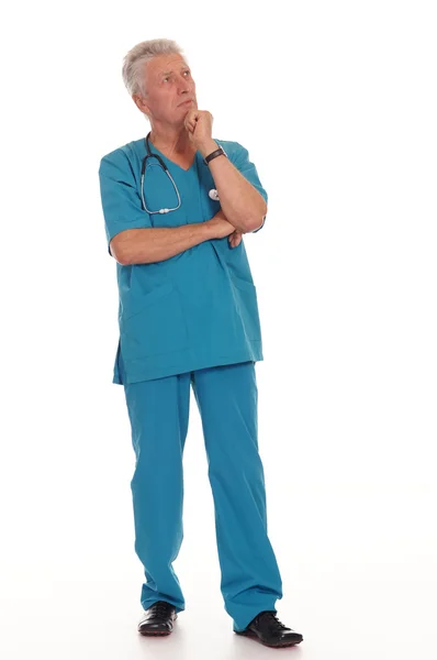 Wieku lekarz na białym tle — Zdjęcie stockowe