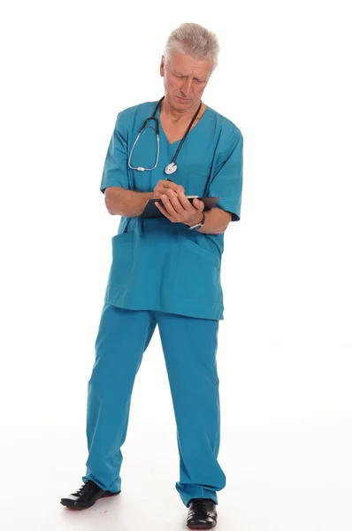 Ładny lekarz na białym tle — Zdjęcie stockowe