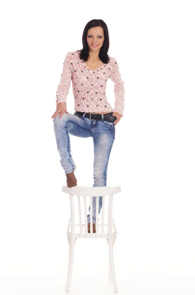 Brunette en stoel — Stockfoto