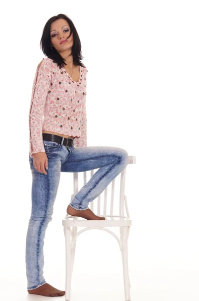 Meisje en stoel — Stockfoto