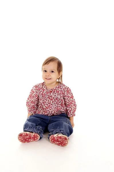 Kleines Mädchen auf weißem Grund — Stockfoto