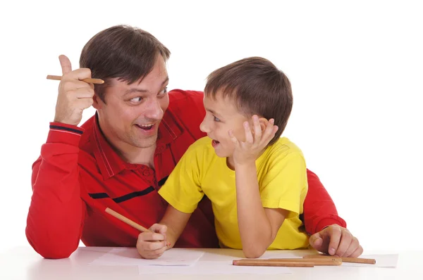Батько і син малюють — стокове фото