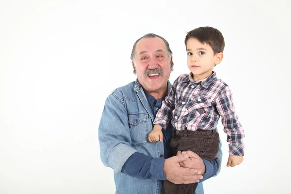 Kind en grootvader spelen — Stockfoto