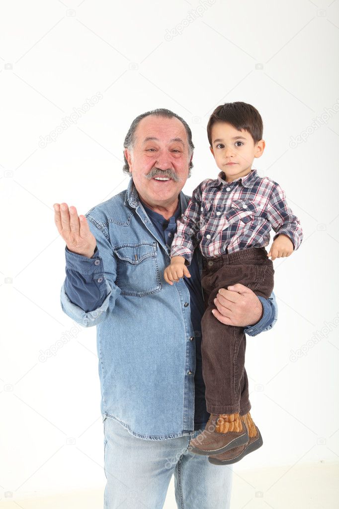 Child and grandfather playing