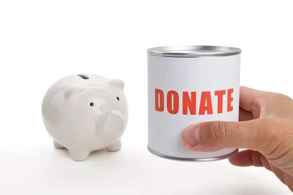 Spendenbox und Sparschwein — Stockfoto