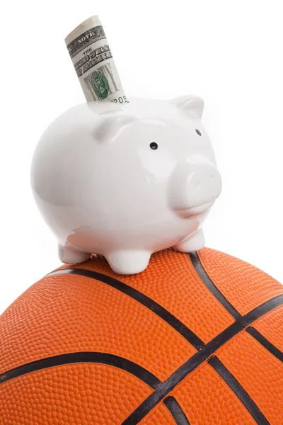 Stock image Piggy Bank and basketball