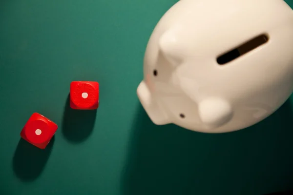 Red Dice and piggy bank — Stock Photo, Image