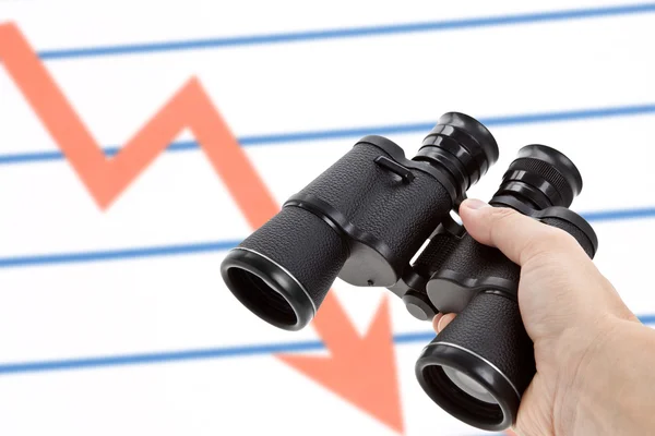 黑色双筒望远镜和市场图表 — 图库照片
