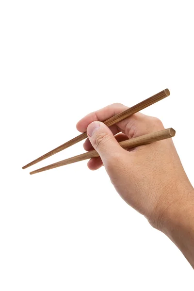 Hand met een paar chopsticks — Stockfoto