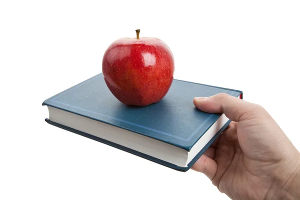 Rode appel en boek — Stockfoto