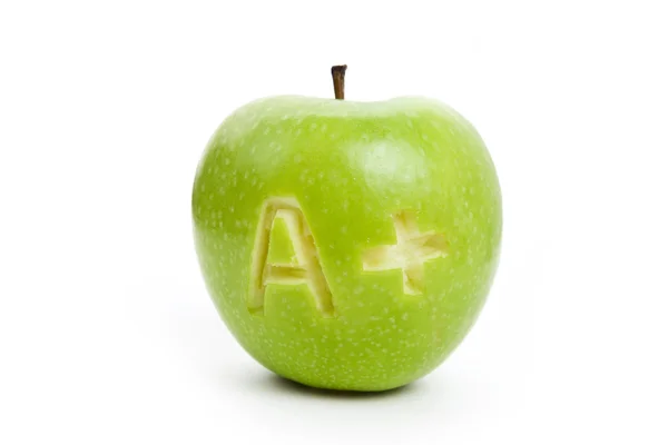 stock image Green apple and A Plus sign