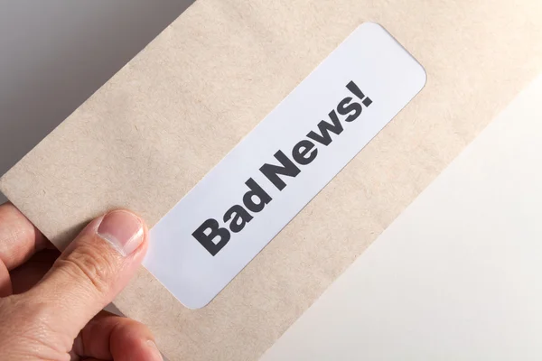 Bad News and envelope Stock Picture