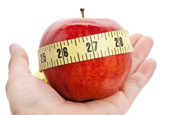 Red apple and Tape Measure — Stock Photo, Image