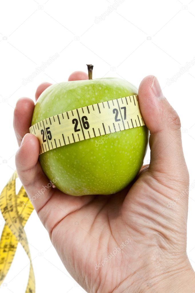 Green apple and Tape Measure