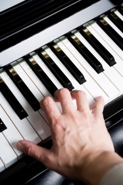 Playing a piano clipart