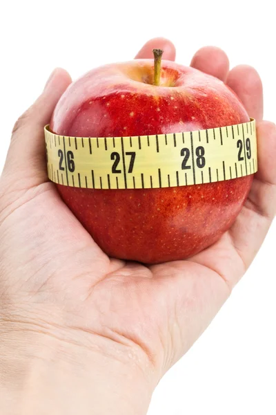 Pomme rouge et ruban à mesurer — Photo