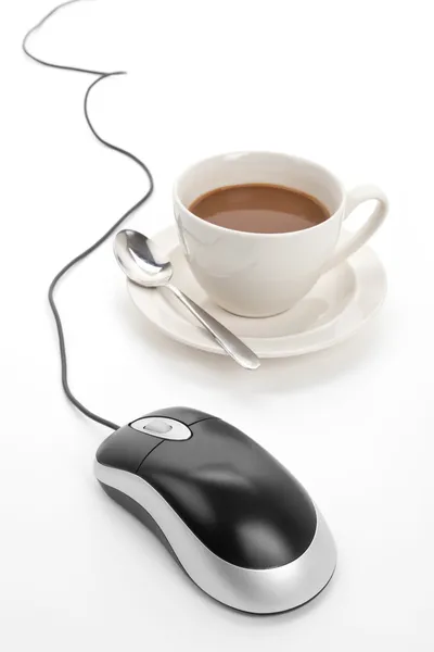 Кавова чашка і комп'ютерна миша — стокове фото