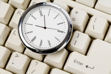 Clock and computer Keyboard clipart