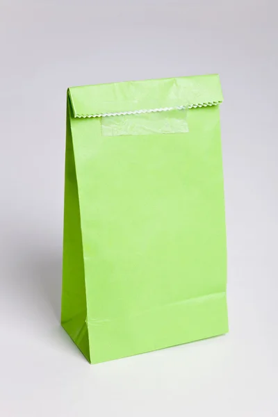 Grüne Papiertüte — Stockfoto