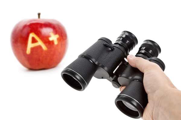 Binoculars and Red Apple — Stock Photo, Image
