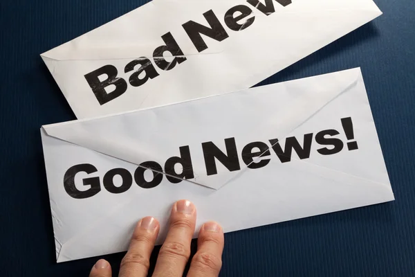 Хороші новини та погані новини — стокове фото