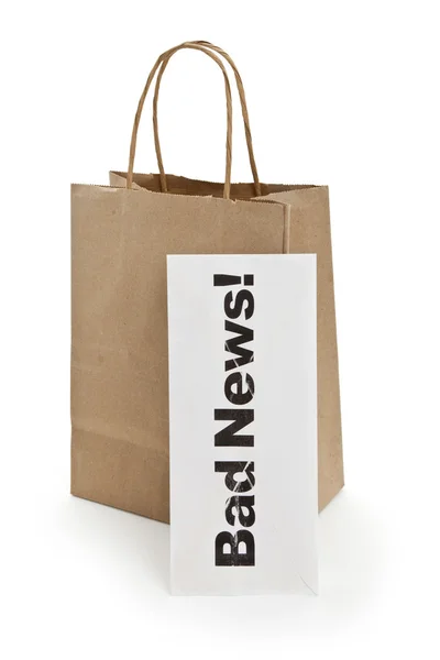 Špatné zprávy a nákupní tašky — Stock fotografie