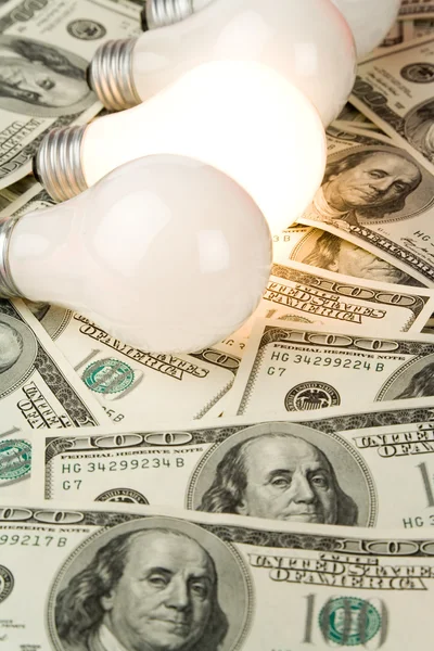 Ljus-lampa och dollar — Stockfoto
