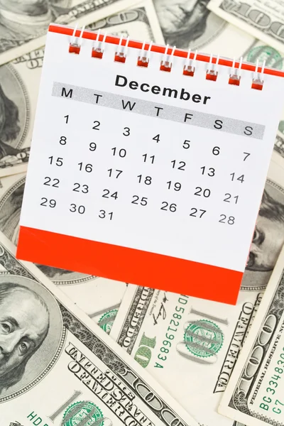 Kalendář a dolar — Stock fotografie