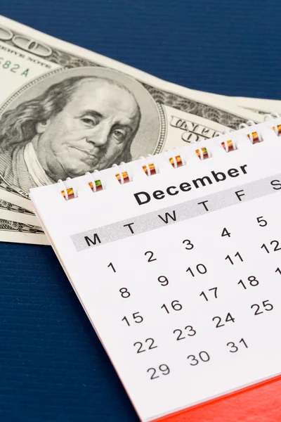 Kalendář a dolar — Stock fotografie